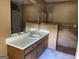 Bathroom featuring a large vanity with a sink and ample cabinet space at 416 Winterwood Dr, Stockbridge, GA 30281
