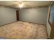 Spacious bedroom with ceiling fan and wall trim at 416 Winterwood Dr, Stockbridge, GA 30281