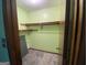 Walk-in closet with shelving providing ample storage and organization space at 416 Winterwood Dr, Stockbridge, GA 30281