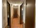 Hallway with a light fixture and doors on either side at 416 Winterwood Dr, Stockbridge, GA 30281
