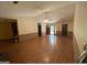 Open-concept living area with wood floors, ceiling fan and lots of natural light at 416 Winterwood Dr, Stockbridge, GA 30281
