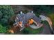 Overhead of a home and garden highlighting illuminated outdoor spaces with lush landscaping at 2878 Heather Row Sw Rdg, Lilburn, GA 30047