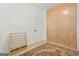 Bedroom features built-in storage cabinets, neutral paint, hardwood floors, and a stylish area rug at 2878 Heather Row Sw Rdg, Lilburn, GA 30047