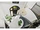 Grand foyer features a stunning chandelier, curved staircase, and elegant black and white tile at 2878 Heather Row Sw Rdg, Lilburn, GA 30047