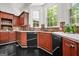 Well-lit kitchen with stainless steel appliances, granite countertops, and decorative tile backsplash at 2878 Heather Row Sw Rdg, Lilburn, GA 30047