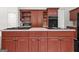 This kitchen features a center island with a cooktop and ample cabinet space at 2878 Heather Row Sw Rdg, Lilburn, GA 30047