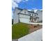 Well-maintained home with manicured lawn and a spacious driveway at 129 Silvercrest Dr # 57, Acworth, GA 30101