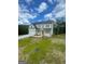Beautiful two-story home with white siding, black roof, and lush green lawn at 129 Silvercrest Dr # 57, Acworth, GA 30101