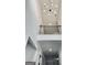 Elegant foyer with a modern chandelier and a clear view of the upper level at 129 Silvercrest Dr # 57, Acworth, GA 30101