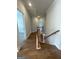 Hallway with hardwood floors leading to the bedrooms on the second floor at 129 Silvercrest Dr # 57, Acworth, GA 30101