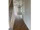 Elegant hallway features dark hardwood floors, white trim, and a coffered ceiling at 129 Silvercrest Dr # 57, Acworth, GA 30101