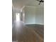 Spacious living room showcasing beautiful hardwood floors and an open floor plan at 129 Silvercrest Dr # 57, Acworth, GA 30101