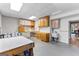Finished basement featuring custom cabinets, built-in shelving and sink area at 134 Mellington Ln, Peachtree City, GA 30269