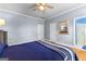 Light bedroom with an ensuite bathroom and ample closet space at 134 Mellington Ln, Peachtree City, GA 30269