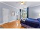 Serene bedroom with hardwood floors and an ensuite bathroom at 134 Mellington Ln, Peachtree City, GA 30269