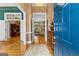 View of the foyer featuring hard wood floors, chandelier, and access to other rooms at 134 Mellington Ln, Peachtree City, GA 30269