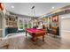 Game room featuring a pool table, natural light, and classic decorations, a fun entertainment space at 134 Mellington Ln, Peachtree City, GA 30269