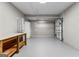 Spacious garage with a work bench and plenty of room for storage at 134 Mellington Ln, Peachtree City, GA 30269