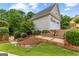 Detached two-car garage with an upstairs and beautifully landscaped walkway at 134 Mellington Ln, Peachtree City, GA 30269