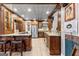 Kitchenette area with stainless steel appliances, stone countertops, and lots of cabinet space at 134 Mellington Ln, Peachtree City, GA 30269