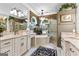 Luxurious bathroom features dual vanities, separate glass shower, and garden tub at 134 Mellington Ln, Peachtree City, GA 30269
