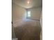 Bedroom featuring carpeted flooring, neutral walls, and a window at 149 Silvercrest Dr # 58, Acworth, GA 30101