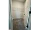 Walk-in closet with wire shelving and carpeted floors at 149 Silvercrest Dr # 58, Acworth, GA 30101