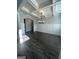 An elegant dining room features wainscoting, a coffered ceiling, and dark hardwood floors at 149 Silvercrest Dr # 58, Acworth, GA 30101