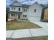 Beautiful two-story home with white siding, covered front porch, and a two-car garage at 149 Silvercrest Dr # 58, Acworth, GA 30101