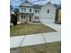 Beautiful two-story home with white siding, covered front porch, and a two-car garage at 149 Silvercrest Dr # 58, Acworth, GA 30101