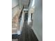 Grand foyer with hardwood floors and stairs leading to a second floor overlooking an archway at 149 Silvercrest Dr # 58, Acworth, GA 30101