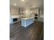 Open concept kitchen with modern appliances and a center island at 149 Silvercrest Dr # 58, Acworth, GA 30101