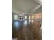 Bright, open living room with hardwood floors, fireplace, and connecting to the kitchen at 149 Silvercrest Dr # 58, Acworth, GA 30101