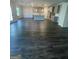 Open concept living and kitchen area featuring hardwood floors and bright lighting at 149 Silvercrest Dr # 58, Acworth, GA 30101
