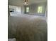 Large open-concept living room with recessed lighting and ample natural light at 149 Silvercrest Dr # 58, Acworth, GA 30101