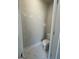 Small toilet room with modern toilet, fresh white paint, and marble flooring at 149 Silvercrest Dr # 58, Acworth, GA 30101