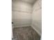 Walk-in closet with gray carpet and white wire shelving at 149 Silvercrest Dr # 58, Acworth, GA 30101