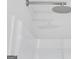 Close-up of a sleek, modern shower head in a bright, clean shower with seamless white walls at 95 Jacoby Dr # 103, Fairburn, GA 30213