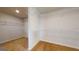 Spacious walk-in closet featuring carpet floors and wire shelving for optimal storage and organization at 95 Jacoby Dr # 103, Fairburn, GA 30213