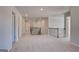 Upstairs hallway with views of the staircase and multiple rooms at 112 Felicity Pike, Locust Grove, GA 30248