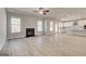 Spacious living room features fireplace, recessed lighting and open access to kitchen at 112 Felicity Pike, Locust Grove, GA 30248