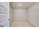 Walk-in closet with an open doorway and shelving at 112 Felicity Pike, Locust Grove, GA 30248