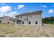 New construction features a covered back porch and spacious backyard with new sod at 120 Felicity Pike, Locust Grove, GA 30248
