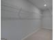 Walk-in closet with wire shelving for optimal storage and organization at 120 Felicity Pike, Locust Grove, GA 30248