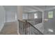 Bright foyer showcasing an ornate staircase and chandelier at 120 Felicity Pike, Locust Grove, GA 30248