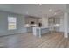 Bright kitchen with an island, stainless steel appliances, and lots of cabinet space at 120 Felicity Pike, Locust Grove, GA 30248