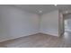 Spacious living room featuring wood floors, recessed lighting, and a neutral color palette at 120 Felicity Pike, Locust Grove, GA 30248
