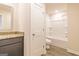 Bathroom with a single vanity, a combined tub and shower, and tile flooring at 220 Fern Dale Dr # 71, Fairburn, GA 30213