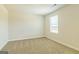 A well-lit bedroom with neutral walls and carpet at 220 Fern Dale Dr # 71, Fairburn, GA 30213