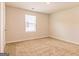 Cozy bedroom featuring neutral walls, carpet, and natural light at 220 Fern Dale Dr # 71, Fairburn, GA 30213